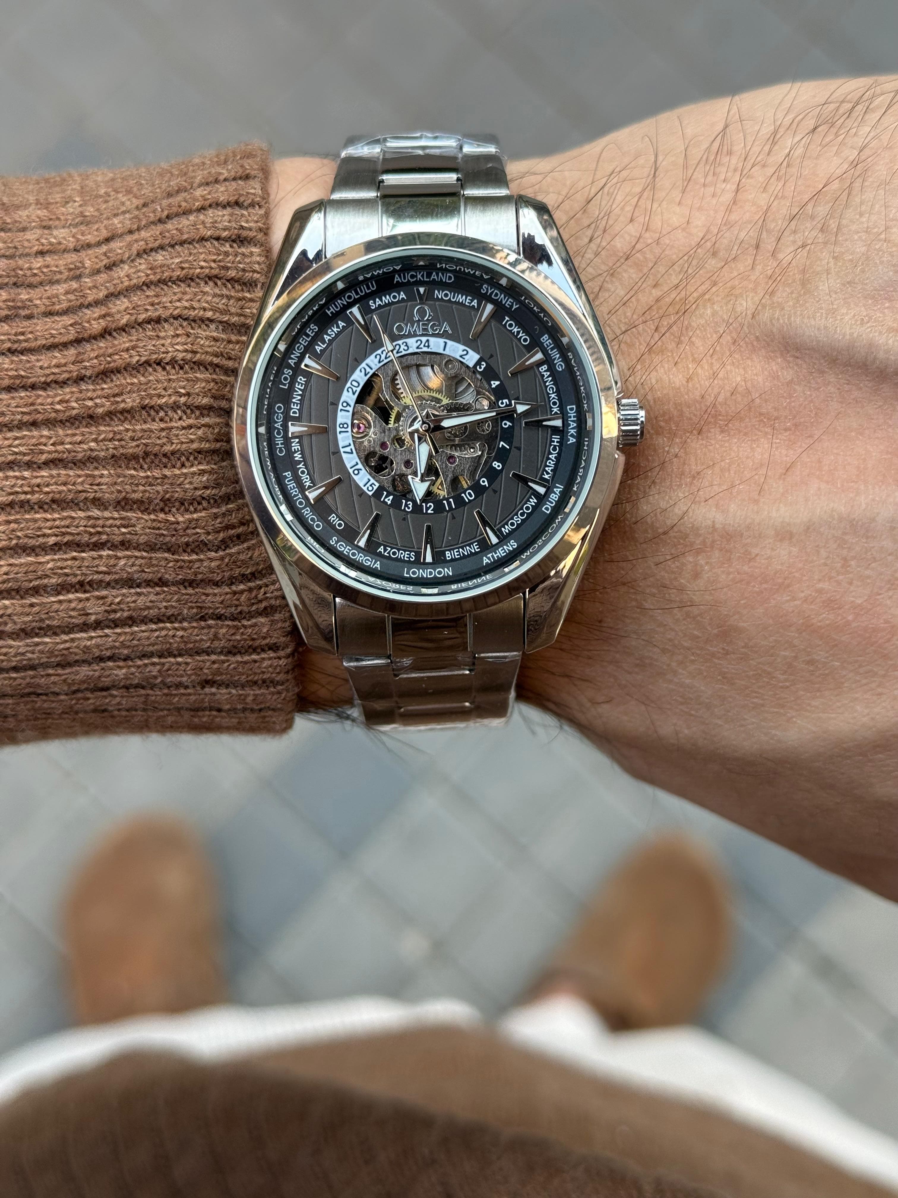 "Omega World Time Skeleton Watch – Luxury Mechanical Timepiece"