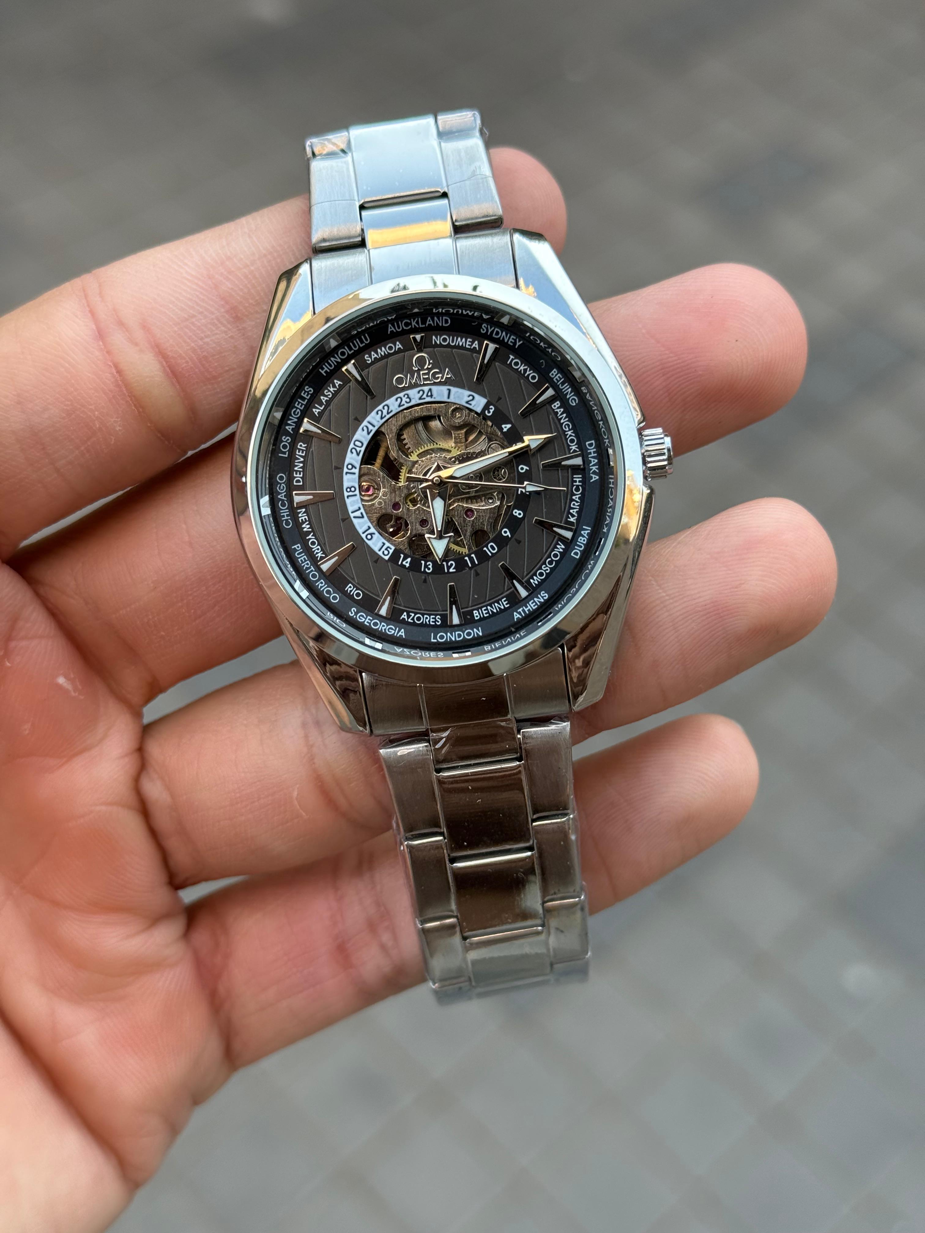 "Omega World Time Skeleton Watch – Luxury Mechanical Timepiece"